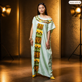Robe longue vert d’eau à motifs africains jaune et vert